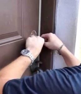 Locksmith opening locked door
